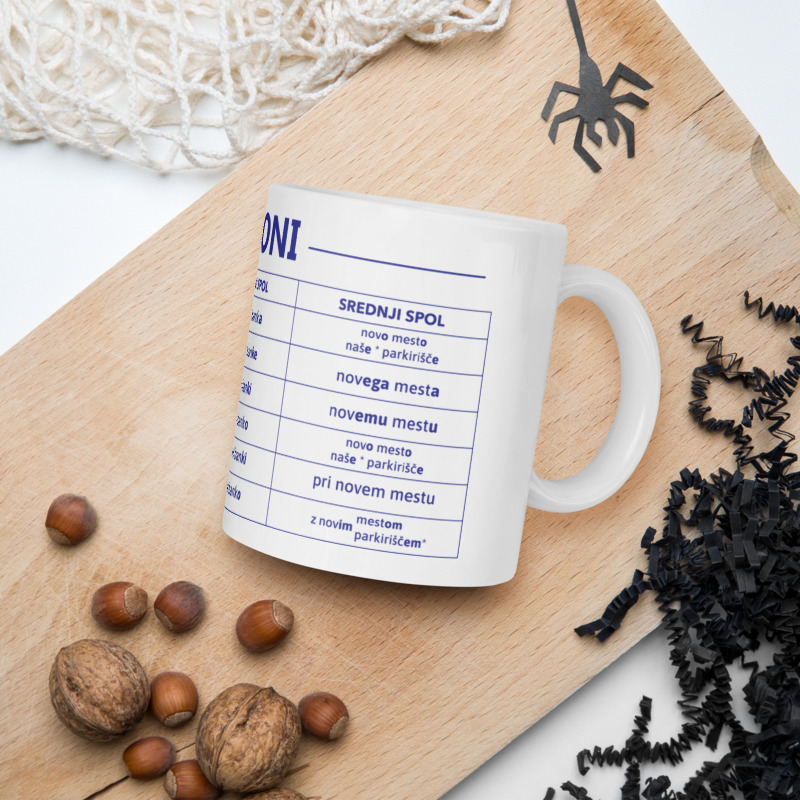 A white mug with slovene skloni print