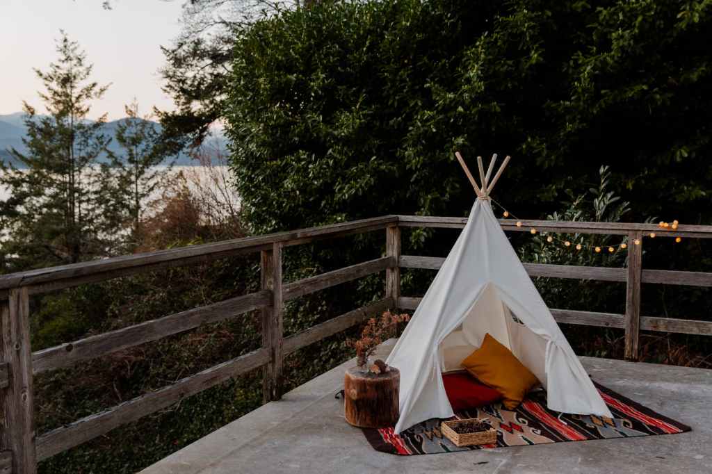wigwam placed on wooden terrace